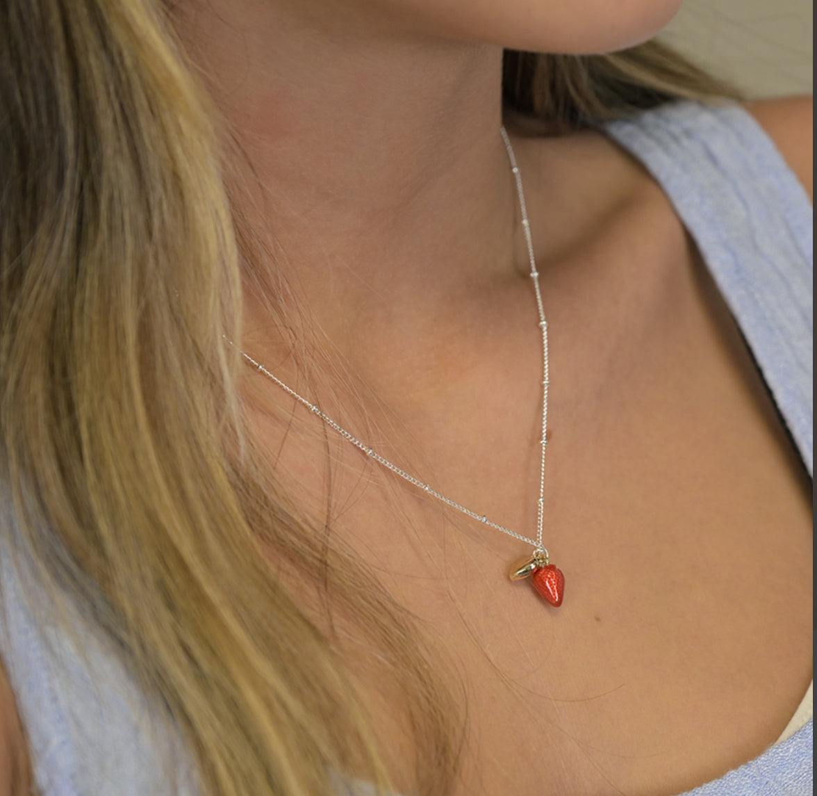 Silver plated necklace with enamel strawberry and golden heart