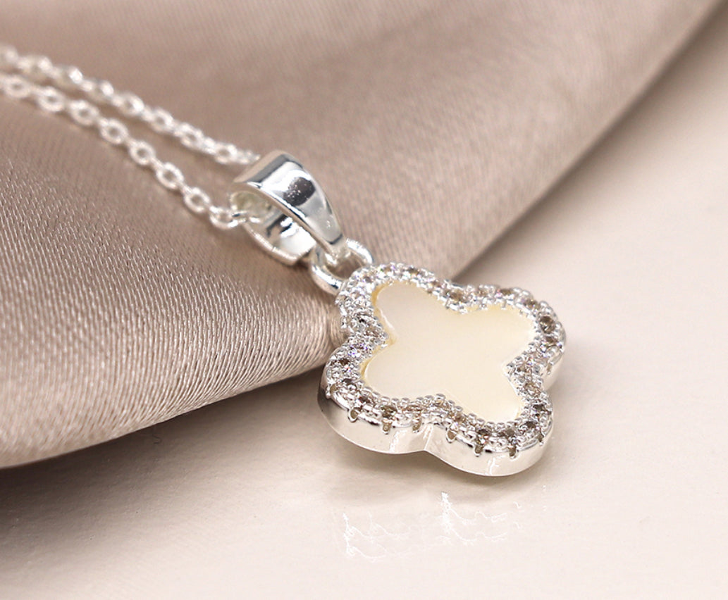 Silver plated crystal edged quatrefoil necklace