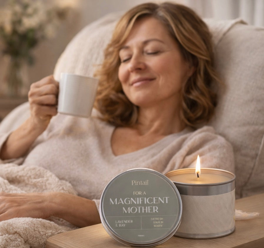 Mother/ woman relaxing with coffee and a candle