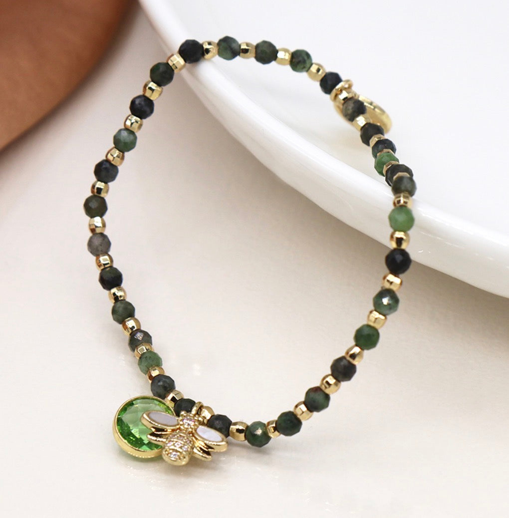 Green and golden bee charm bracelet