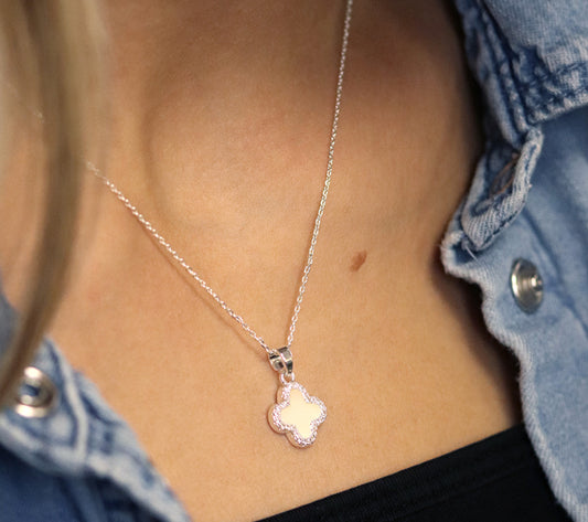 Silver plated crystal edged quatrefoil necklace