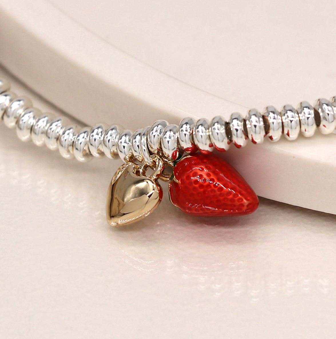 Silver plated bracelet with strawberry and gold heart