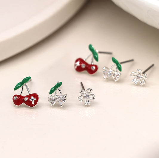 Silver plated cherry and flower triple stud set