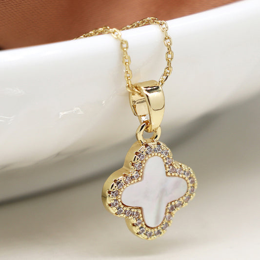 Golden crystal edged quatrefoil necklace