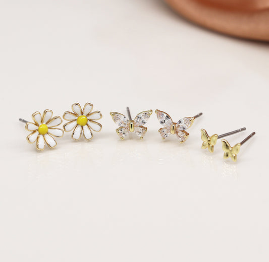 Golden triple flower and butterfly stud set