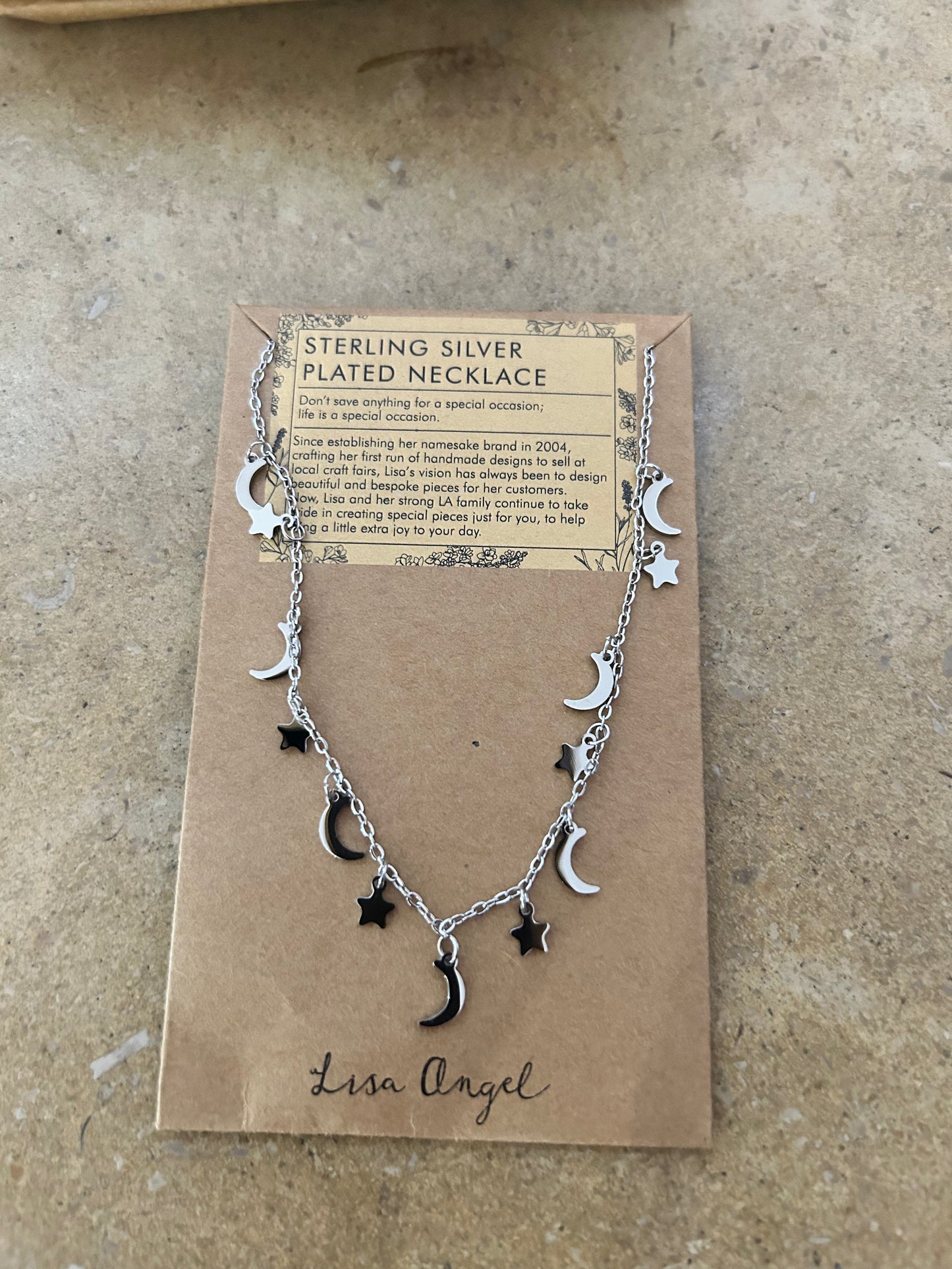 Silver Star and Moon Charm Necklace